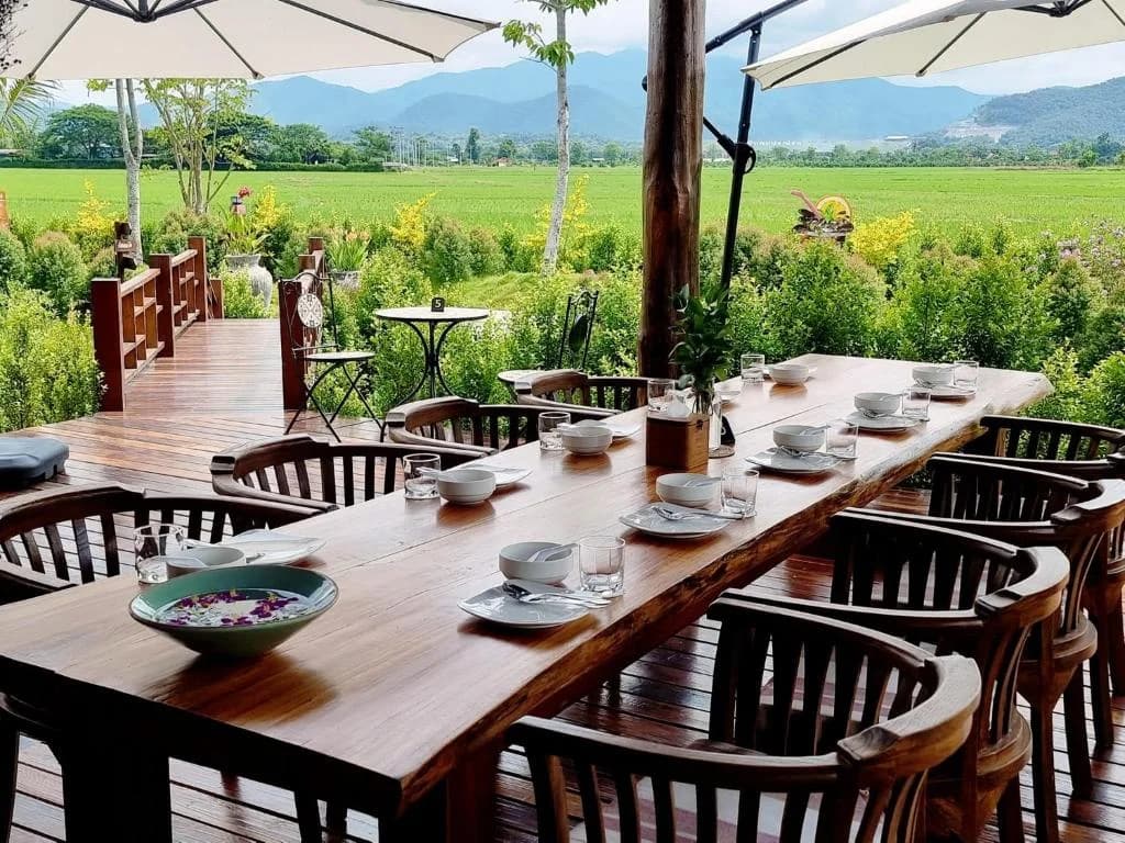 Breakfast table overlooking the rice fields at Doona Resort